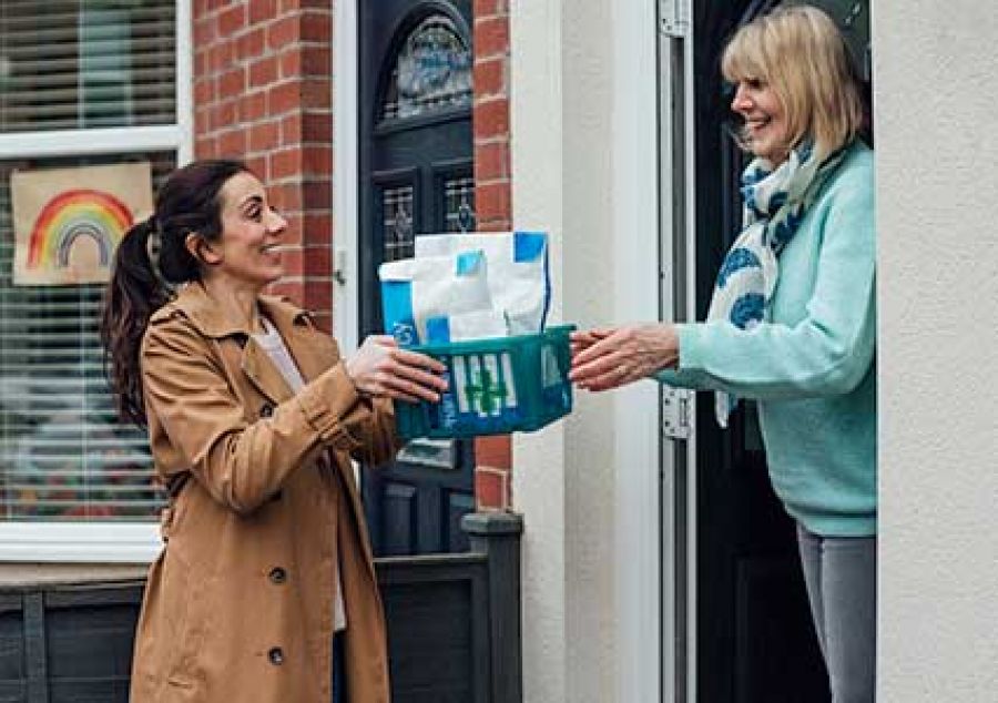 Carer collecting medication