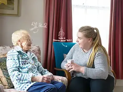 The Great Care Company Carer and client laughing and smiling