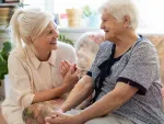 carer and client talking about home care quality score