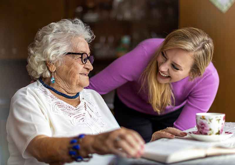 carer and client laughing