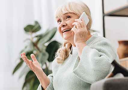 woman talking on phone about care services