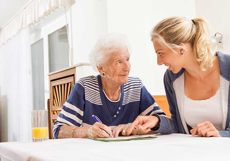 carer helping client with dementia advice