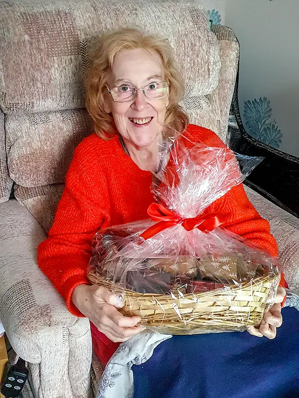 Client exceptionally happy with her caring Christmas gifts hamper