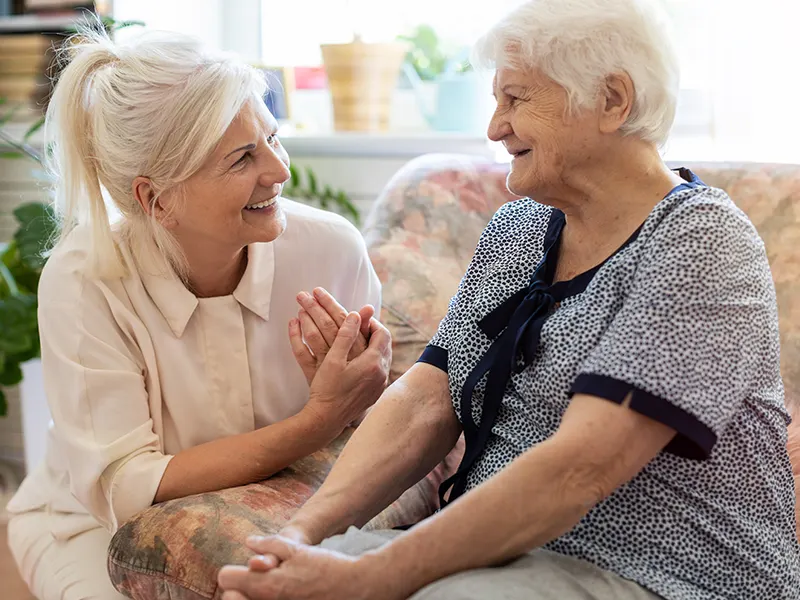 carer and client talking about home care quality score