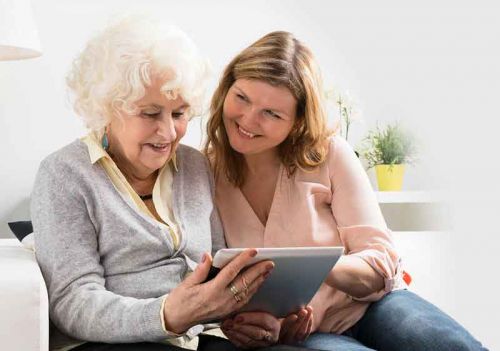 mother and daughter browsing our care services