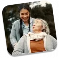 Elderly caregiver providing home assistance for the elderly