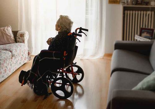 socially isolated lady in wheelchair