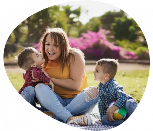 Mother spending time with children enjoying employee health and wellbeing perks at The Great Care Company