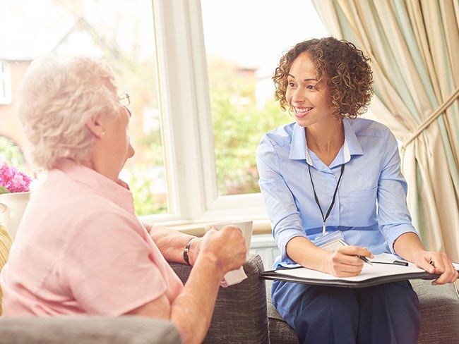 Care team and client going over care plan