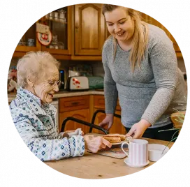 private carer helping client with lunch