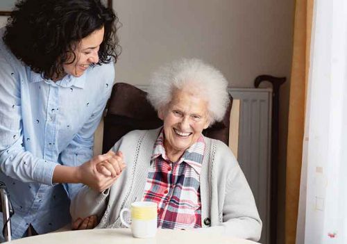 lady and carer laughing