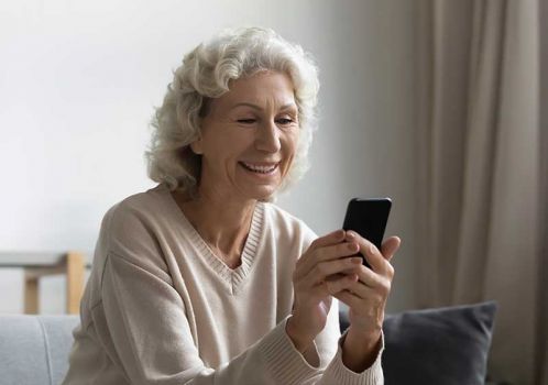 woman speaking with our team for dementia advice